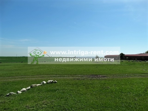 Investment property, representing a LAND PLOT, bordering the regulatory boundaries of the city of Haskovo, situated in the Southern Industrial Zone of the city.