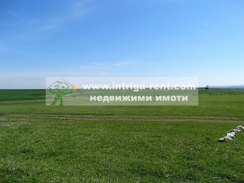 Investment property, representing a LAND PLOT, bordering the regulatory boundaries of the city of Haskovo, situated in the Southern Industrial Zone of the city.